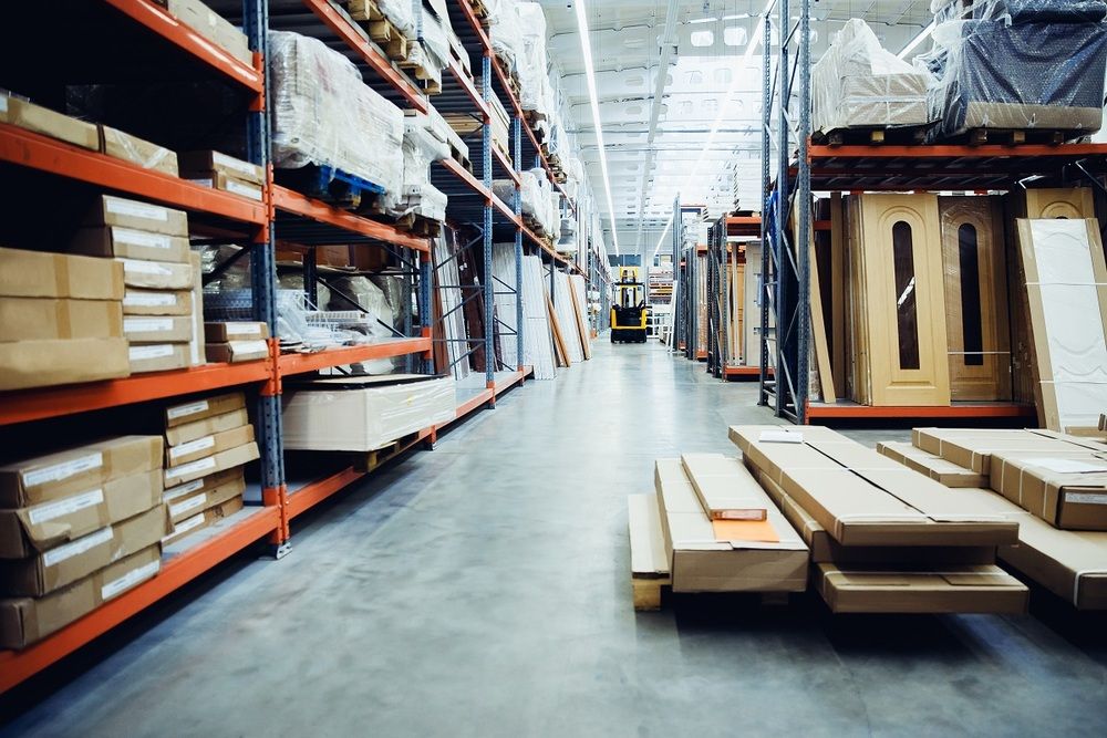 Shelf With Structural Materials On The Shelves In The Construction Warehouse.